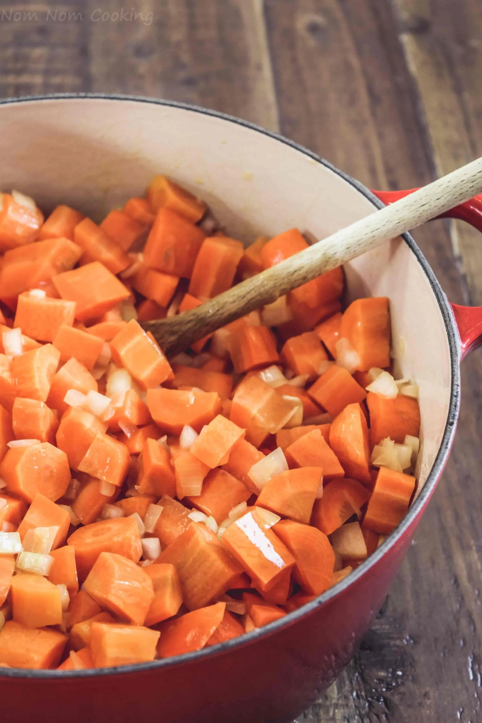 Carrots and onions cooking in the pot