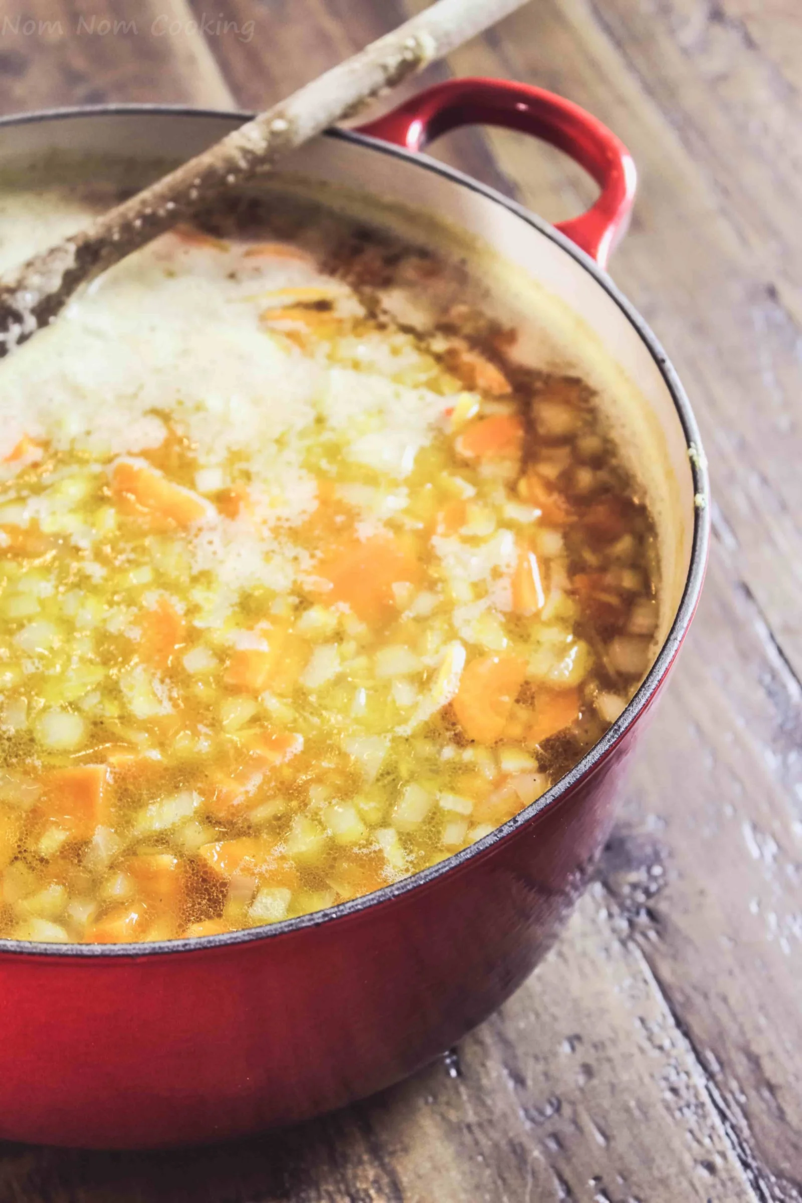 Stock added to the carrots and onions before simmering